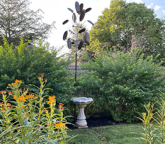 flowerbed added to center of back yard