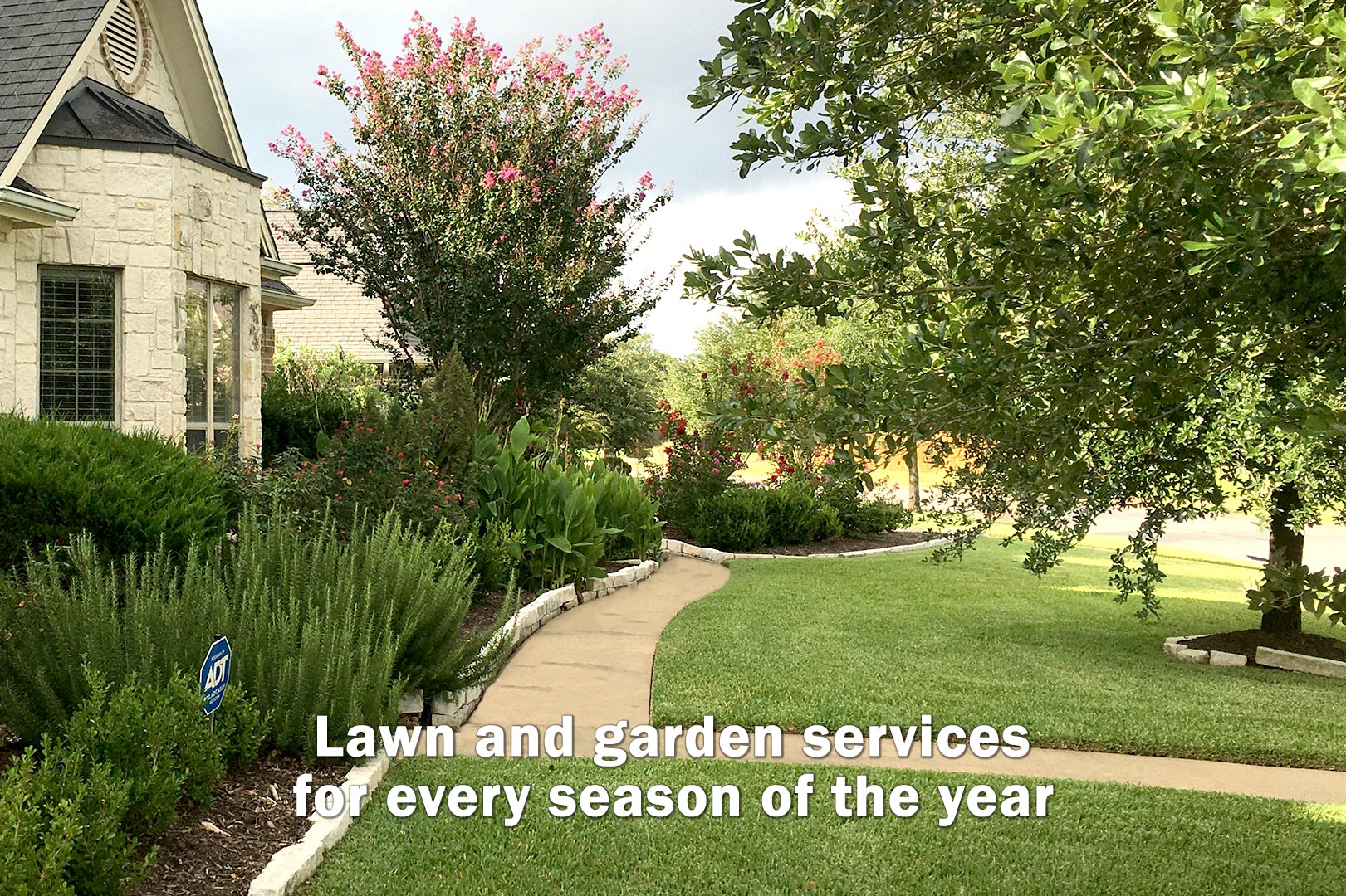 lawn with mowing and flower bed garden in College Station