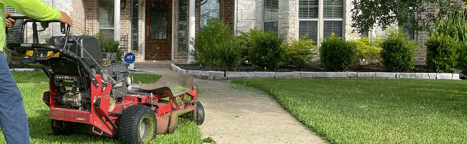 mowing a lawn in College Station